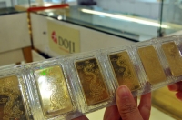 Giá vàng trồi sụt quanh mốc 33 triệu đồng